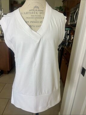 EUC Athleta off-white sleeveless V-neck golf vest wide hem band size XS
